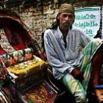 220px-Cycle_rickshaw_wallah_in_Dhaka